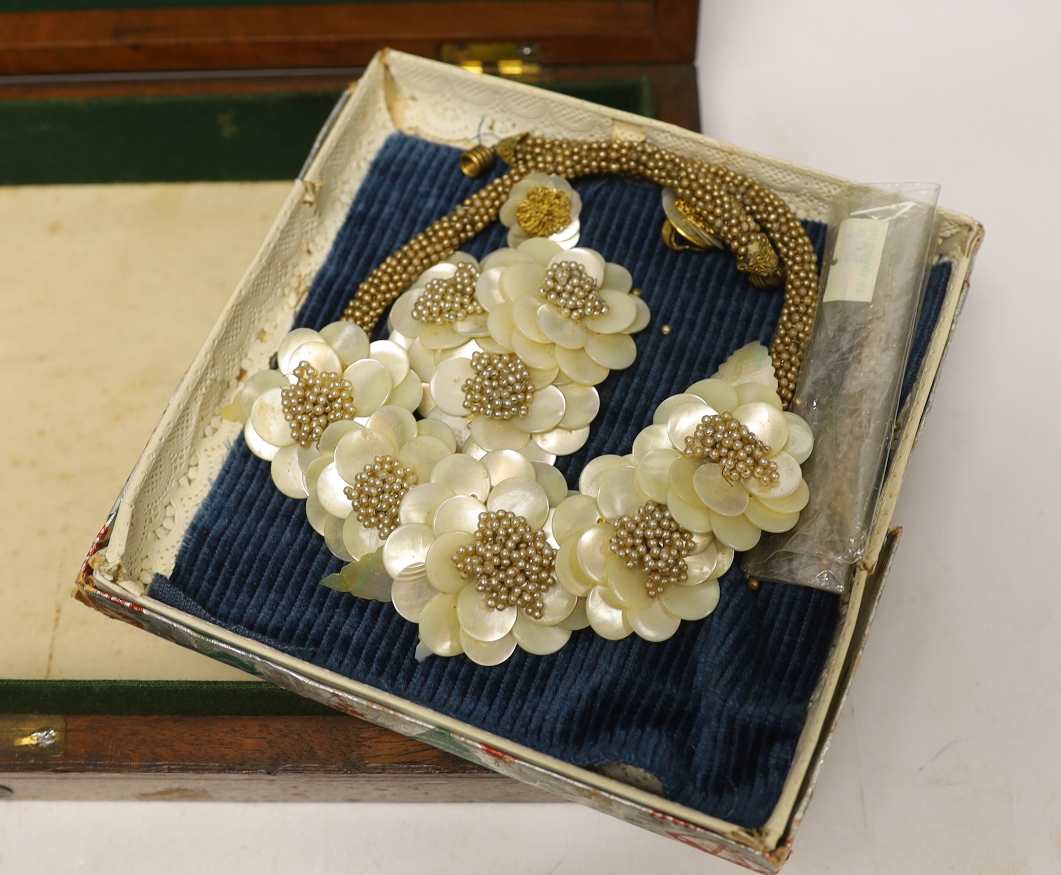 A quantity of assorted mainly costume jewellery and a wooden box.